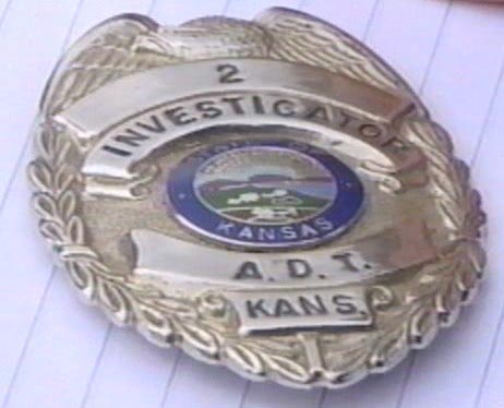 Dennis Rader badge adt 1972